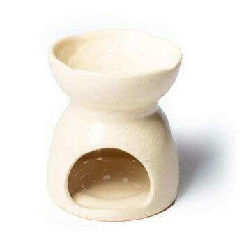 A small Бежов маслен дифузер – Дървото на живота on a white surface.