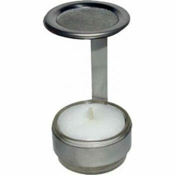 Тамянник (кандило) от инокс със сито и свещ with a white candle inside.