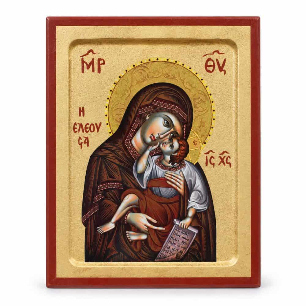 Религиозна икона, изобразяваща Дева Мария, държаща младенеца Исус, и двете с ореоли, нарисувана върху златен фон с гръцки надписи.